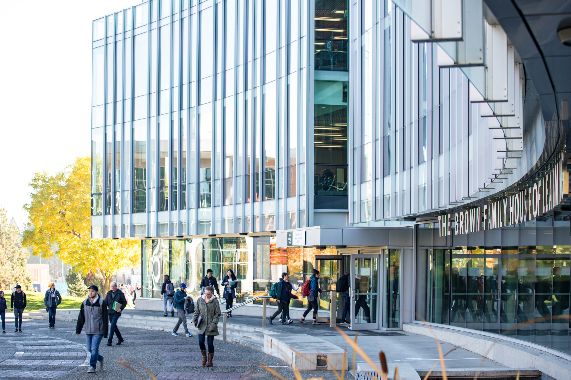 Students walking outside The Brown Family House of Learning